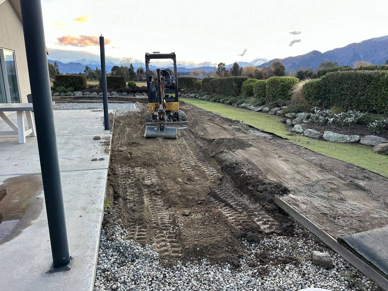 Trenching work alongside a house